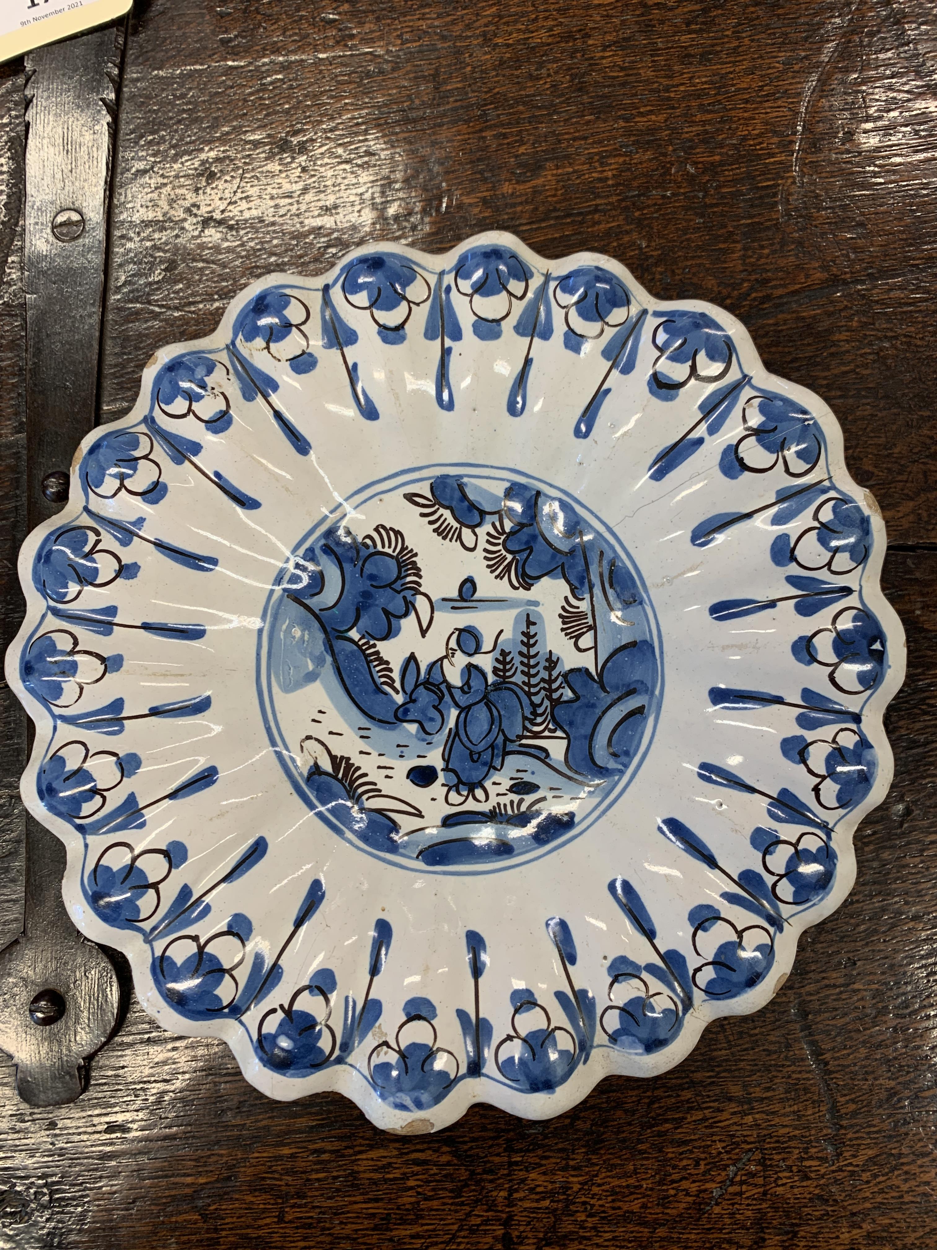 TWO DELFT POTTERY LOBED DISHES EARLY 18TH CENTURY each painted in blue and black with a seated - Image 8 of 16