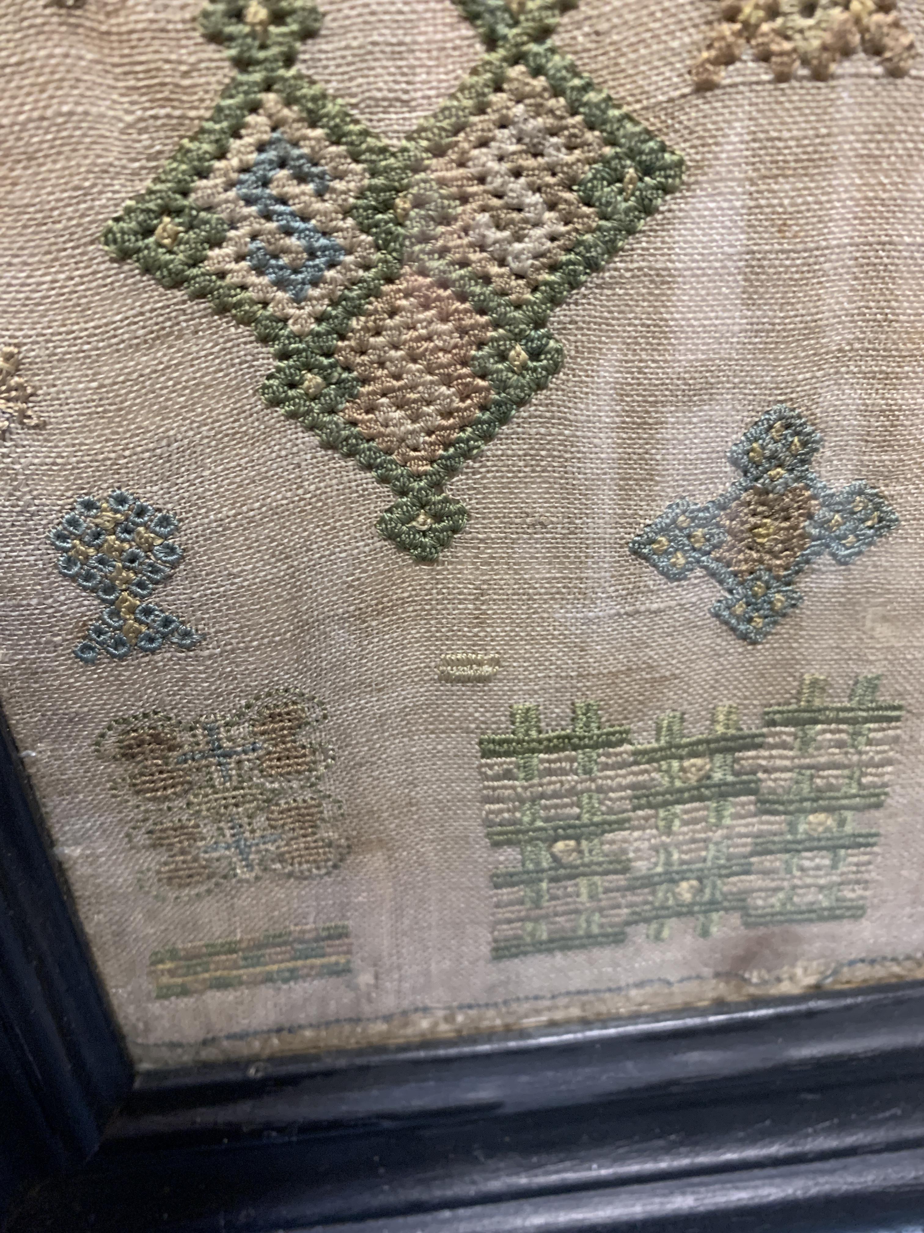 A RARE NEEDLEWORK SPOT SAMPLER BY GRACE THRUSTON, MID-17TH CENTURY worked with polychrome silks on - Image 12 of 15