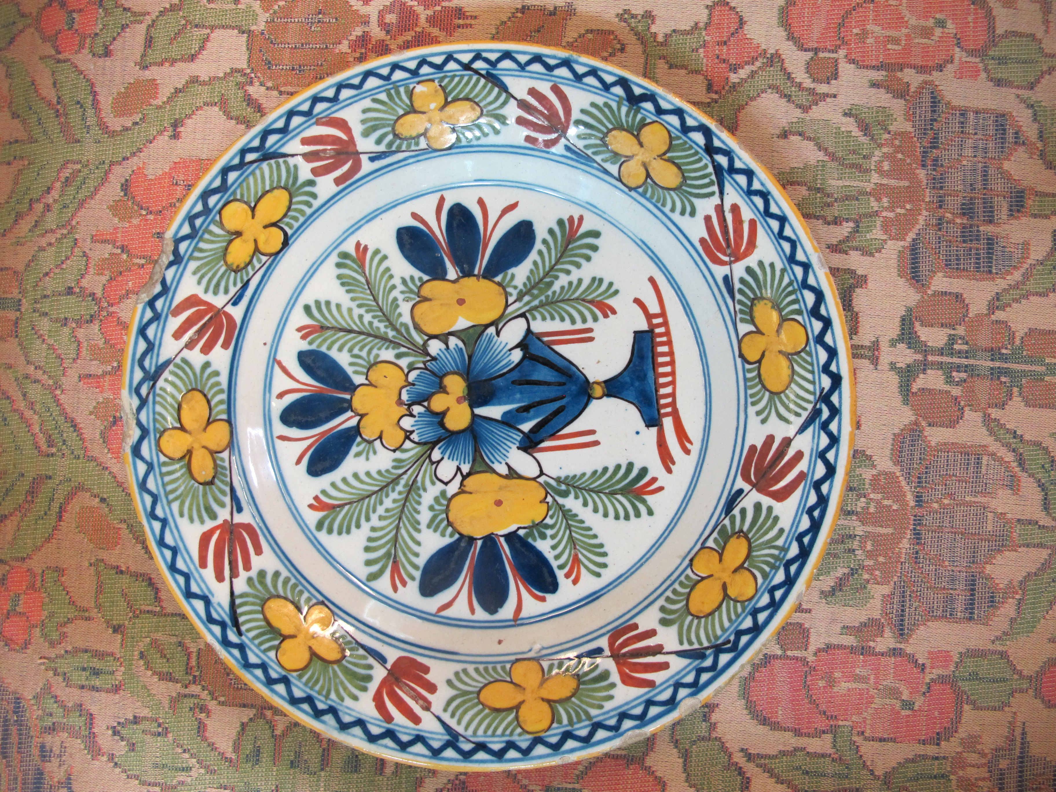 THREE DELFTWARE POTTERY PLATES 18TH CENTURY polychrome decorated with a bird on a fence, and urns of - Image 19 of 24