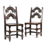 TWO CHARLES II OAK 'YORKSHIRE' CHAIRS C.1670 each with scroll uprights and twin arched backs