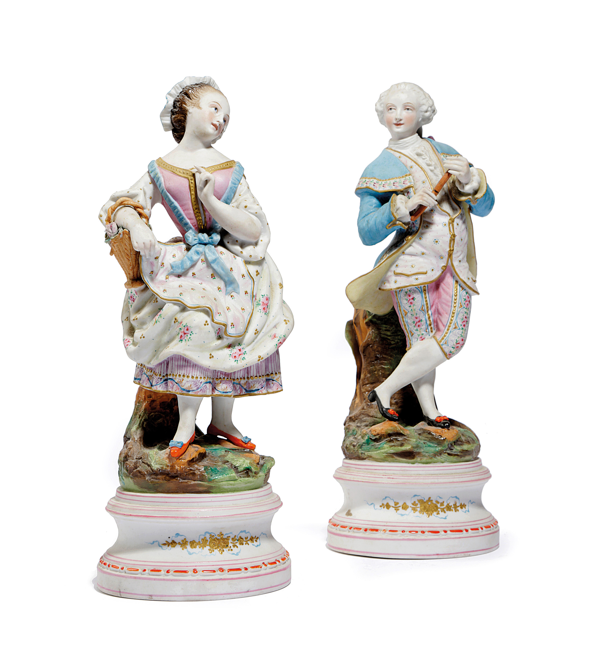 A PAIR OF CONTINENTAL BISCUIT PORCELAIN FIGURES LATE 19TH CENTURY of a well dressed gentleman and