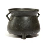 A BRONZE CAULDRON PROBABLY WEST COUNTRY, 17TH CENTURY with a flared rim and angular lug handles,