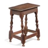 A CHARLES II OAK JOINT STOOL LATE 17TH CENTURY the rectangular seat with a moulded edge, the rails