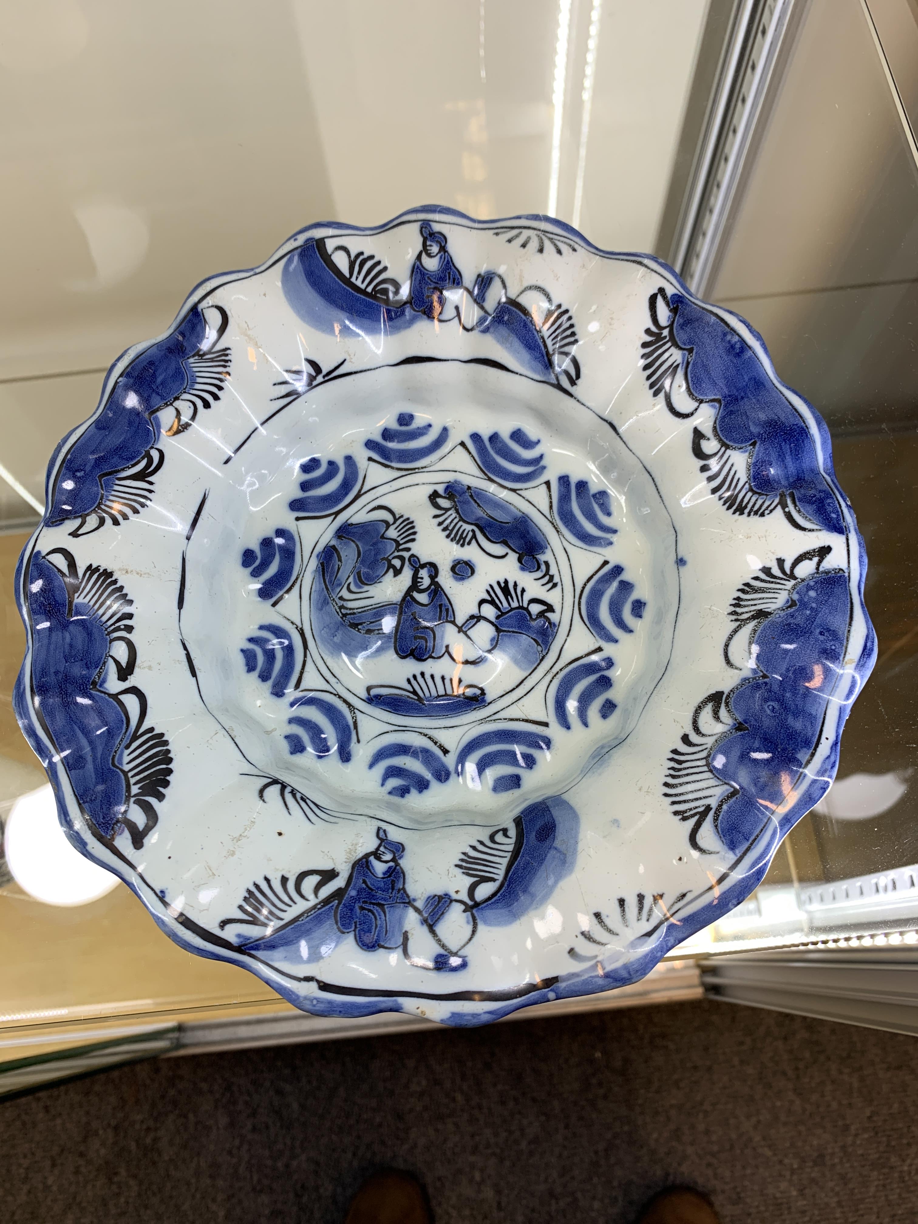 TWO DELFT POTTERY LOBED DISHES EARLY 18TH CENTURY each painted in blue and black with a seated - Image 2 of 16