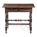 AN OAK SIDE TABLE LATE 17TH / EARLY 18TH CENTURY the rectangular top with a moulded edge, above a