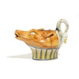 A STAFFORDSHIRE PEARLWARE POTTERY FOX AND GOOSE SAUCE BOAT C.1800 the spout in the form of a fox's