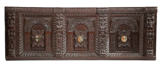 AN ELIZABETH I OAK OVERMANTEL LATE 16TH / EARLY 17TH CENTURY AND LATER with triple arched panels