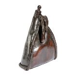 A LEATHER SADDLE FLASK 18TH CENTURY the spout with a turned fruitwood stopper, with a strap 43.5cm
