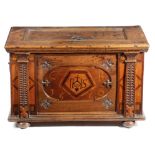 A 17TH CENTURY WALNUT CHEST POSSIBLY GERMAN OR SWISS, DATED '1660' the hinged lid revealing an