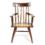 AN IRISH PRIMITIVE SYCAMORE AND ASH 'GIBSON' ARMCHAIR 19TH CENTURY the curved comb top rail above