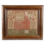 AN EARLY VICTORIAN NEEDLEWORK SAMPLER BY AGNES CARR worked in cross stitch with a view of the church