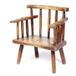 AN IRISH SYCAMORE AND ASH PRIMITIVE CHILD'S CHAIR 19TH CENTURY with traces of red painted