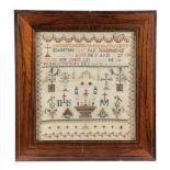 λ A MID-19TH CENTURY FRENCH NEEDLEWORK SAMPLER BY JOSEPHINE CARIGUT worked with coloured silks and