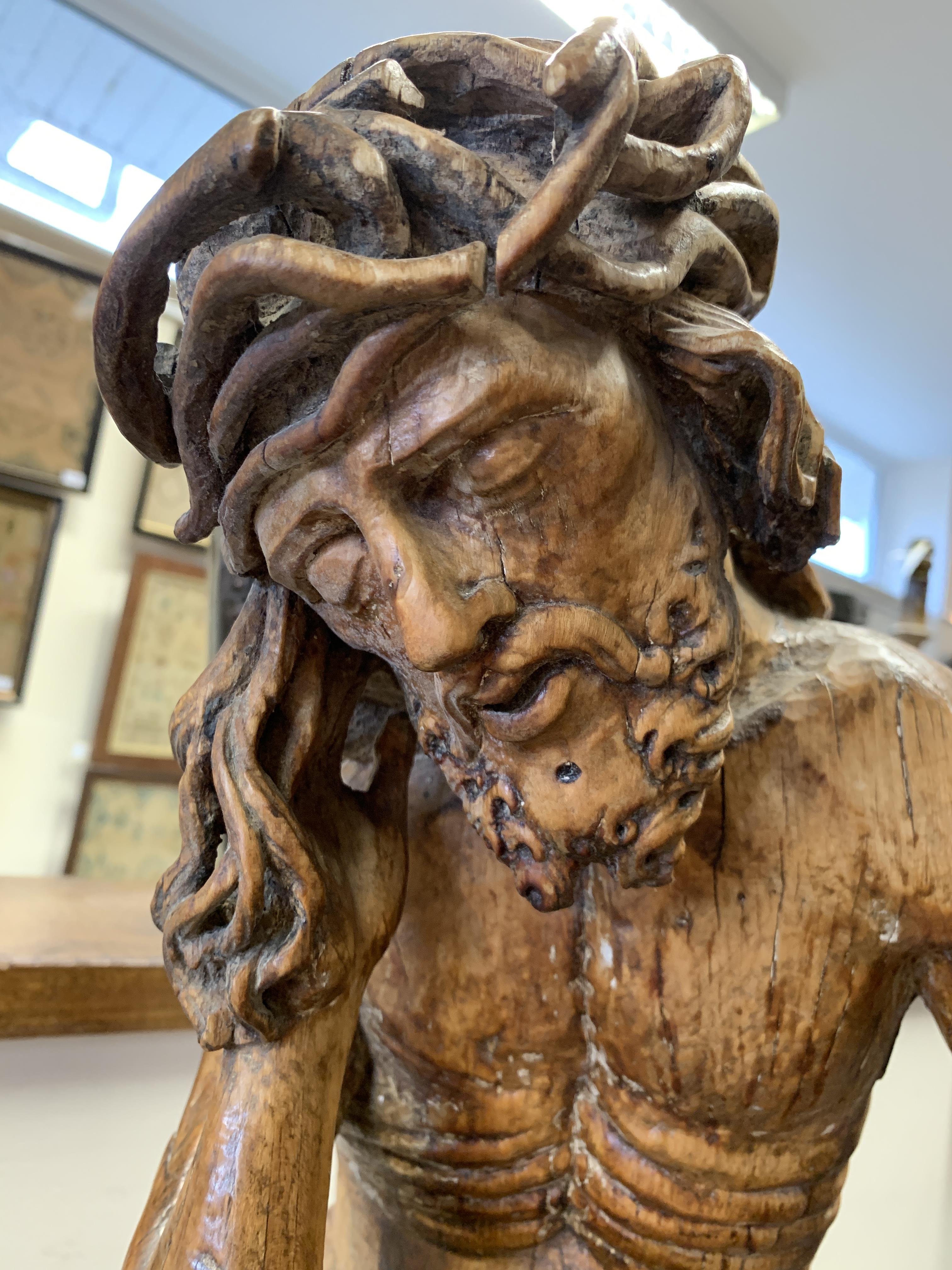 A GERMAN CARVED LIMEWOOD FIGURE OF CHRIST THE MAN OF SORROWS 16TH CENTURY depicted seated wearing - Image 7 of 22