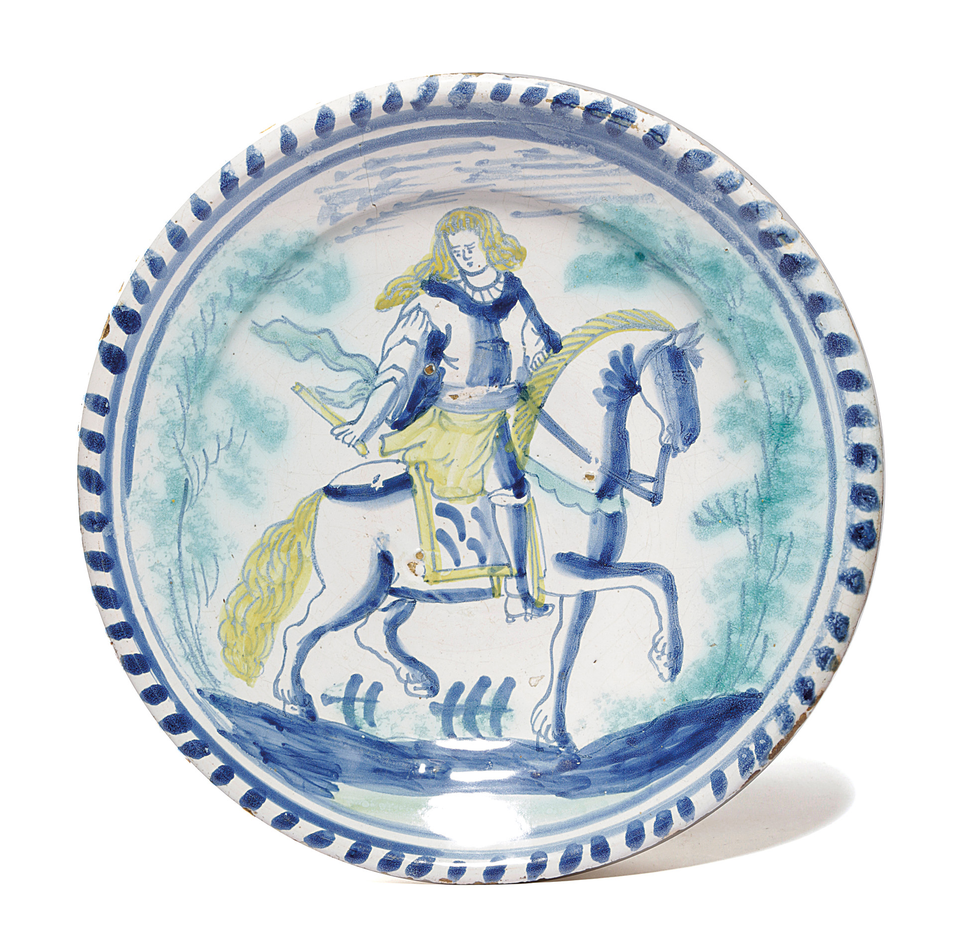 A DELFTWARE POTTERY EQUESTRIAN CHARGER PROBABLY LONDON, C.1700 painted in blue, green and yellow