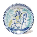 A DELFTWARE POTTERY EQUESTRIAN CHARGER PROBABLY LONDON, C.1700 painted in blue, green and yellow