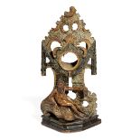 AN 18TH CENTURY POLYCHROME LIMEWOOD AND PINE WATCH HOLDER PROBABLY SWISS carved with Old Father Time