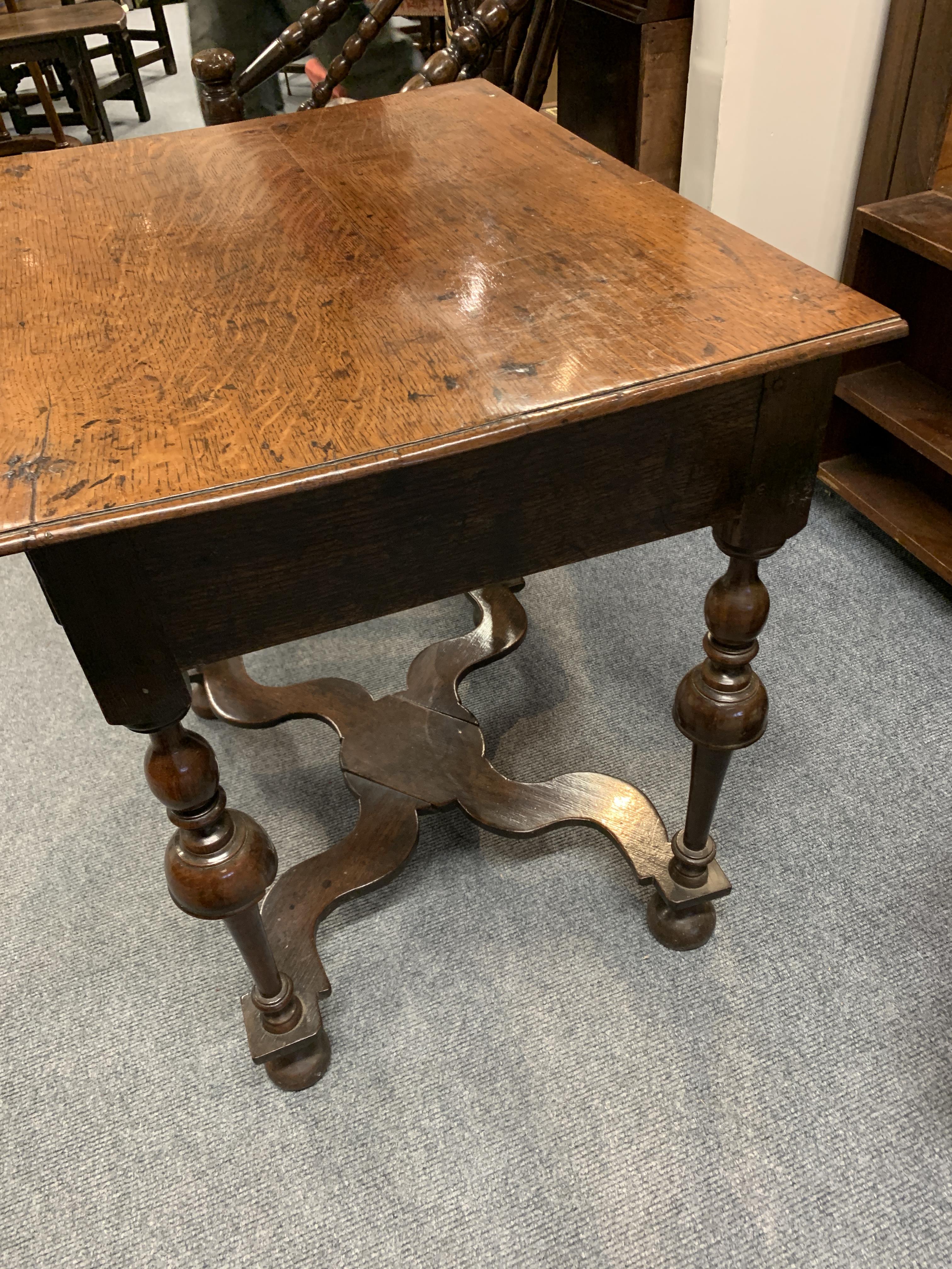 A WILLIAM AND MARY OAK SIDE TABLE C.1690 the rectangular top with a moulded edge, above a frieze - Image 4 of 14