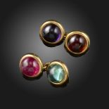 A pair of gem-set gold cufflinks, set with cabochon gemstones including tourmalines, amethysts and a