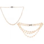 A three-row cultured pearl choker necklace, the graduated cultured pearls measure 4 - 9mm