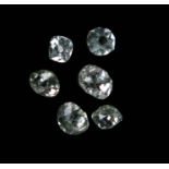 † Six unmounted diamonds, some with faint fancy hue, 1.17cts total