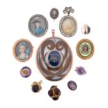 λ A late 18th century mourning pendant, centred with a blue enamel plaque with initials and border