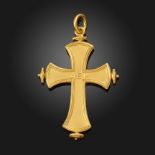 A 19th century gold cruciform pendant, applied with gold disc finials to each quarter, centred