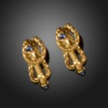 A pair of yellow gold chain and clasp cufflinks by Boucheron, cabochon sapphire terminals, signed