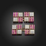 A pair of ruby and diamond dress cufflinks, each square link is quartered with pairs of baguette-