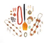 λ Various items of jewellery, including three pairs of poissarde gilt metal earrings; a coral bead