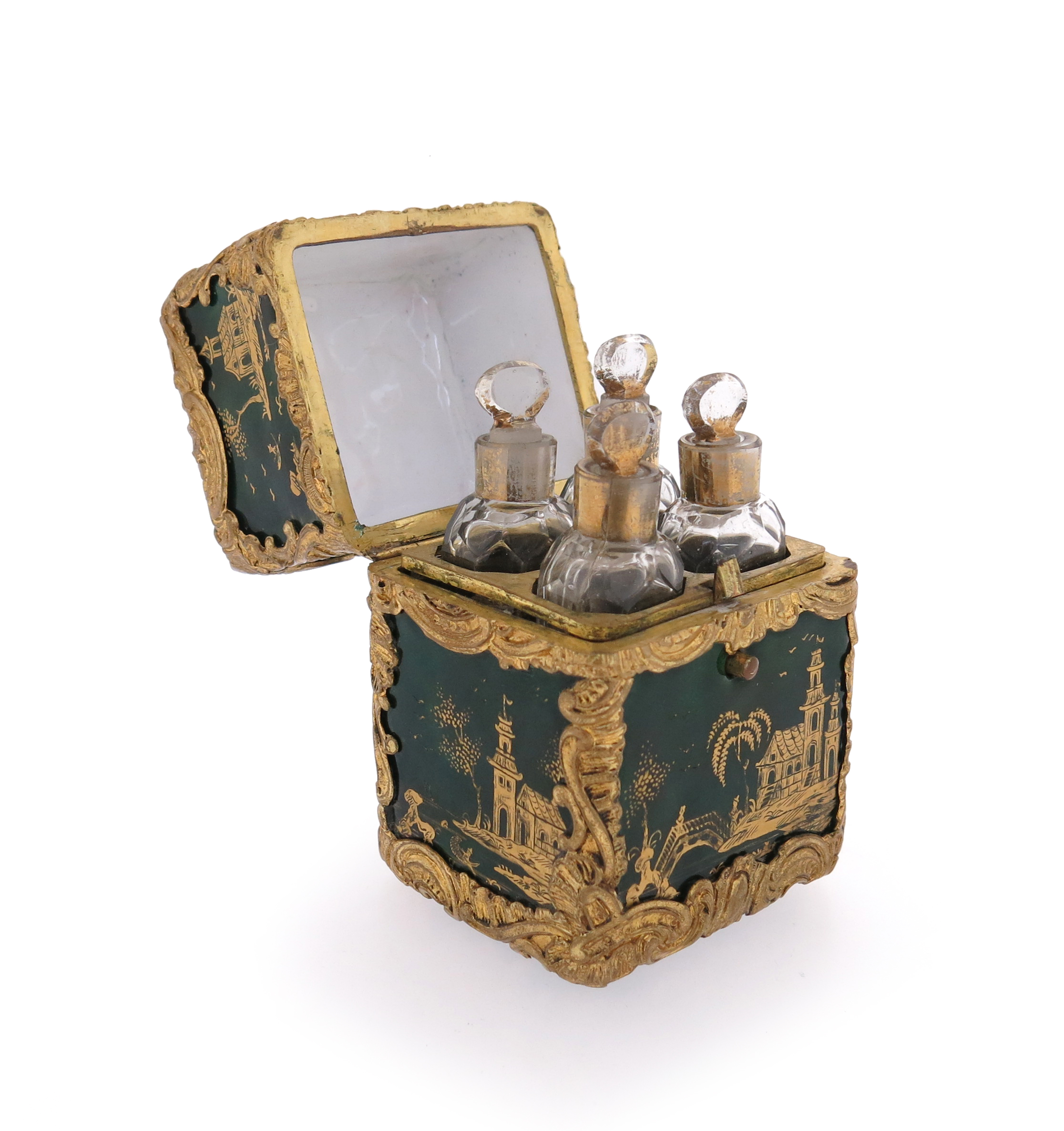 An 18th century enamel bottle holder with hinged cover, of rectangular form with green and gold