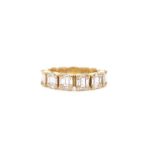 A diamond cluster eternity ring, set with clusters of baguette-shaped diamonds in gold, size K