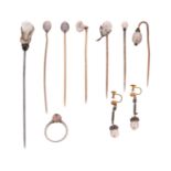 A collection of pearl-mounted items, including a collection of seven pearl-mounted stick pins (