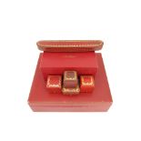 Six jewellery boxes by Cartier, including a slightly curved bracelet case