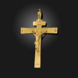 A 19th century gold crucifix pendant, the cross with engraved decoration, applied with a figure of