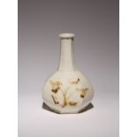 A KOREAN FACETED BOTTLE VASE JOSEON DYNASTY OR LATER, 19TH OR 20TH CENTURY The globular body with