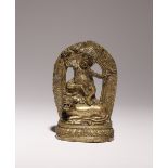 A TIBETAN BRONZE SCULPTURE OF DORJE DROLO 18TH/19TH CENTURY Dorje Drolo wears flowing robes and a
