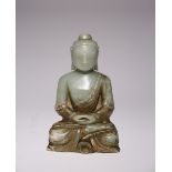 A CHINESE CELADON JADE FIGURE OF AMITABHA BUDDHA QING DYNASTY Carved seated in dhyanasana with his