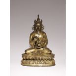 A CHINESE GILT-BRONZE FIGURE OF A PADMAMBHAVA 18TH CENTURY OR LATER Seated in vajrasana on a