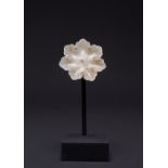 A CHINESE PALE CELADON JADE FLOWER-SHAPED PLAQUE YUAN/MING DYNASTY Formed as a flower with seven