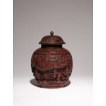 A CHINESE CINNABAR LACQUER OVOID VASE AND COVER LATE QING DYNASTY The body carved with a