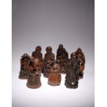 EIGHT LARGE CHINESE BAMBOO FIGURES LATE QING DYNASTY Three carved as Shoulao, the others variously