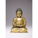 A CHINESE GILT-BRONZE SEATED FIGURE OF BUDDHA MING DYNASTY OR LATER Seated with hands pressed in