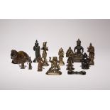 A COLLECTION OF THIRTEEN SMALL BRONZE ITEMS 17TH CENTURY AND LATER Including an elephant desk weight