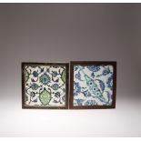 TWO SQUARE IZNIK TILES 17TH CENTURY Each decorated in underglaze blue with touches of turquoise