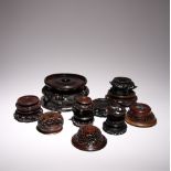 A COLLECTON OF CHINESE WOOD STANDS AND COVERS 19TH AND 20TH CENTURY Decorated with flowers, scrolls,