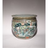 A LARGE CHINESE FAMILLE VERTE 'FIGURAL' FISHBOWL LATE QING DYNASTY Decorated to the exterior with