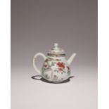 A CHINESE FAMILLE ROSE 'TWO QUAILS' TEAPOT AND COVER 18TH CENTURY The pear-shaped body enamelled