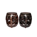 TWO SIMILAR CHINESE HONGMU AND MOTHER OF PEARL INLAID DRUM-SHAPED STOOLS QING DYNASTY The circular