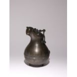 A CHINESE ARCHAISTIC BRONZE SILVER AND GOLD INLAID POURING VESSEL AND COVER QING DYNASTY The bulbous